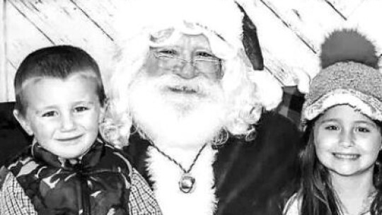 Jaxson and Acelyn Herring enjoy their visit with Santa at Coupland School’s Breakfast with Santa. Photo by Megan Herring