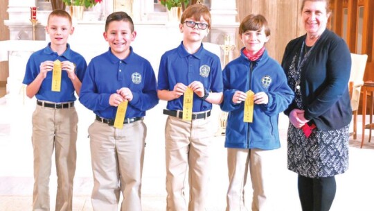 St. Mary’s Catholic School fourth grade students in Taylor celebrate being named to the honor roll for the second quarter of the 2021-22 school year.