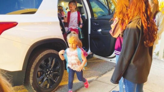 Thrall High School softball players welcome elementary students to school at the car rider line Feb. 11. Both sets of young Tigers and Tigerettes could see changes affecting their time on campus depending on what propositions are approved by Thrall voters in May. Facebook / Thrall Elementa...