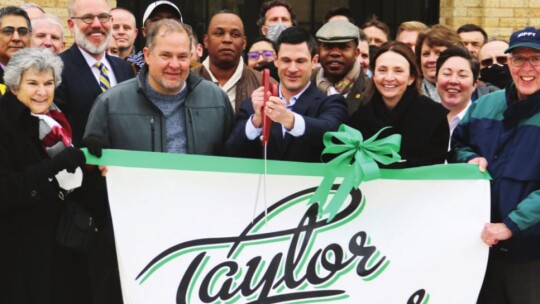 Jon Calvin cuts the ribbon to make Lone Star Circle of Care’s new home in Taylor official.