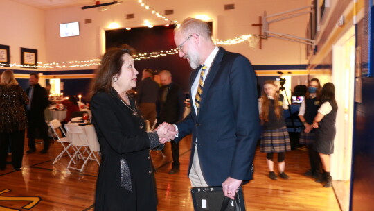 Cecilia Abbott and Mayor Brandt Rydell are shown with a gift presented to the First Lady from the city of Taylor.