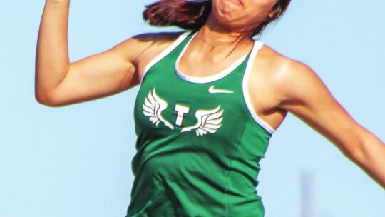 Ana Crawford takes her turn in the shot-put event at the Cotton Boll Relays.