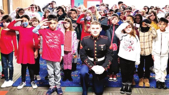 Hutto ISD graduate Noah Goertz visited elementary students and was welcomed with a salute.