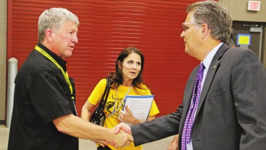 Williamson County Judge Bill Gravell (right) thanks Jim and Gina Maunder for their work and dedication to help people impacted by the tornando.