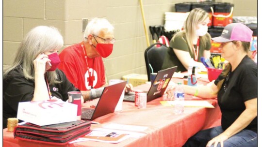 (From left) Jill Martin, Skip Cordes and Gina Gudzelak are members of the American Red Cross who were at the MARC Center Tuesday.