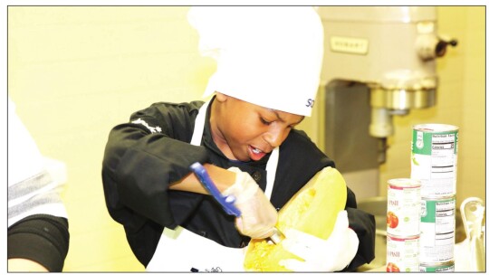 Ruben Rochez prepares a spaghetti squash for his recipe, Luca Spaghetti.