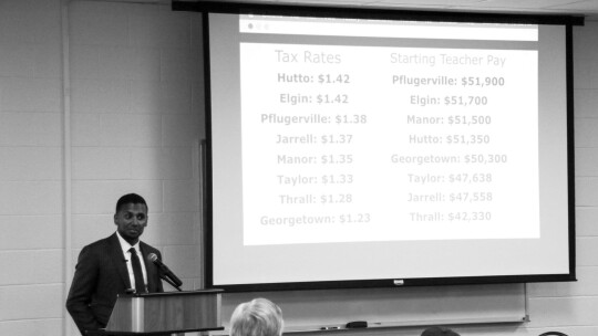 Devin Padavil gives a breakdown of starting pay wages for teachers in Taylor and surrounding school districts. Photos by Jason Hennington