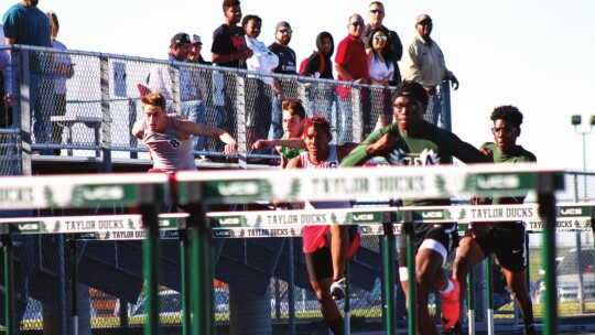 As a junior, Jarvis Anderson has already broken the school record in the 300-meter hurdles, a record that stood for nearly four decades. Photos by Matt Hooks