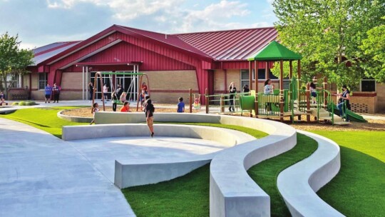 People tour upgrades to the library at Hutto Elementary School April 29.