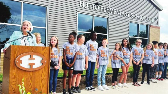 Superintendent Celina Estrada Thomas talks during a ribbon cutting at Hutto Elementary School April 29.