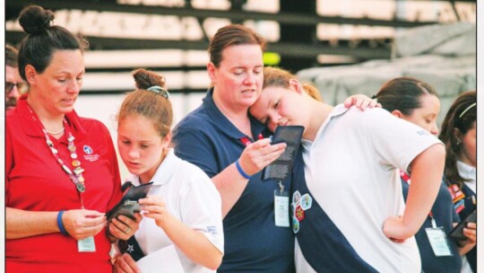 Members of the American Heritage Girls Georgetown Troop TX2911 pray during the National Day of Prayer event at Heritage Square in Taylor May 5. Pictured are Keri Bennight, Cassie Curtain, Cary Lynn Edwards and Emma Edwards.