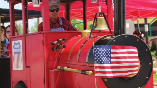 All aboard the train as it rides through the downtown area during Blackland Prairie Days. Photo by Jason Hennington