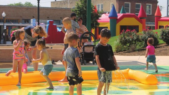 Heritage Square’s Splash Pad delights children and parents in Taylor May 7. Photo by Fernando Castro