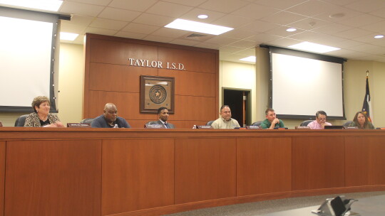 Marilyn Tennill, Shorty Mitchell, Superintendent Devin Padavil, board president Marco Ortiz, Joseph Meller, Jim Buzan and Cheryl Carter hear from residents during a public hearing during their Taylor ISD school board meeting in Taylor May 24.  Photo by Fernando Castro