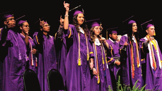 Granger seniors sing the school song sharing one final high school memory together. Photo by Matt Hooks