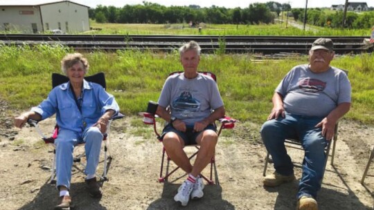 Supervising the dumpsters along the tracks were Alderwoman Karen Marosko, Mayor Jack Piper and Buz Garry. Photos by Susan Garry