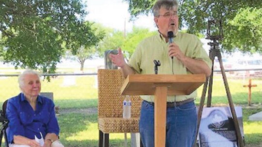 Charlene Hanson Jordan looks on as Trey Smith discusses the history of the area during a ceremony at Type Church near Coupland May 14. Photos by Susan Garry