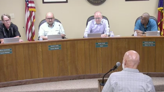 Councilmembers Mitch Drummond, Dwayne Ariola, Mayor Brandt Rydell and Mayor Pro-Tem Gerald Anderson listen to Taylor chief financial officer Jeff Wood during their meeting at city hall in Taylor June 9. Captured via screenshot / City of Taylor