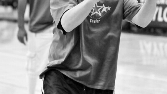 Shing Star Randy Ramirez shoots a jump shot from the right side of the court at the 7th annual Taylor Press 3-on-3 Basketball Tournament.