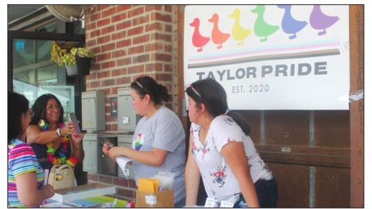 People stop by the Taylor PRIDE booth during the group’s festival in Taylor June 26, 2021. Photo by Fernando Castro