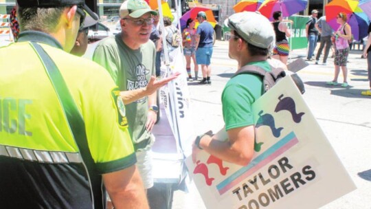 Mayor Brandt Rydell (left) talks with Caleb Ripple during the Taylor PRIDE Music &amp; Arts Festival in Taylor June 25. Photo by Fernando Castro