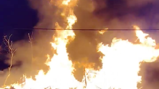  Fire demolishes the historic home of Dr. James Lee Dickey in the 500 block of Burkett Street in Taylor July 10. Courtesy video / Mike Fish