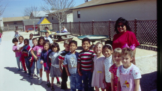 One of Bernice Sanchez’s favorite career memories is the construction of the outdoor learning center at Northside Elementary School. She is shown with a kindergarten class at the completed learning center during the 1997-98 school year. Photo by Tim Crow