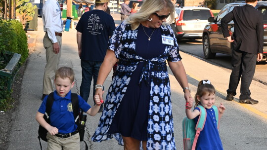 St. Mary’s Catholic School Head of School Heidi Altman welcomes students on the first day of school in Taylor Aug. 11.