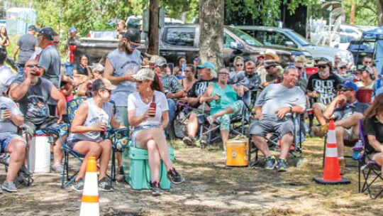 Murphy Park fills with people anxious to find out the winners of the Taylor International Barbecue Cookoff in Taylor Aug. 20.