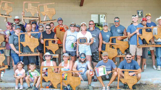 Winners from this year’s Taylor International Barbecue Cookoff gather together after the awards ceremony in Murphy Park Aug. 20. Photos by Fernando Castro