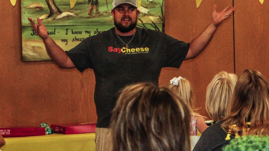 SayCheese president Corey Graef makes the official announcement to the organization that they have purchased a food trailer. Photo by Edie Zuvanich