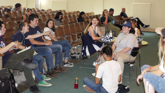 Cast members for 'Walker' relax in the auditorium as they wait to be called to the set Sept. 21 at Old Taylor H igh. Photos by Catherine McGary