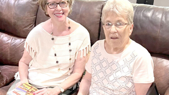 Suzanne Thoele (left) and Lois Luedtke visit about children’s books.