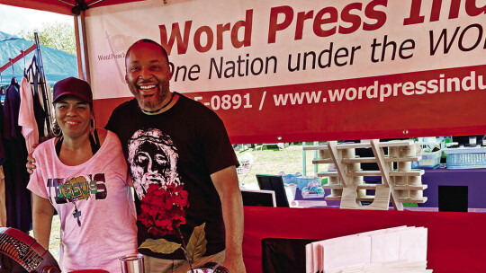 Alana and Dwaine Thompson share T-shirts and hoodies with different verses from scripture at Hutto Market Days Sept. 17 Photos by Nicole Lessin