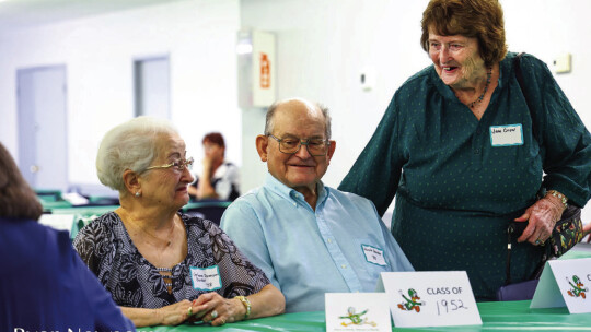 Members of the class of 1952 reunite to celebrate homecoming at the Hall of Fame luncheon Sept. 23.