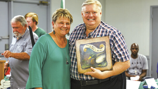 Tim Crow (right) is now a member of the Duck Hall of Fame. He was congratulated by Pat Helbert. Photo by Ryan Newsome