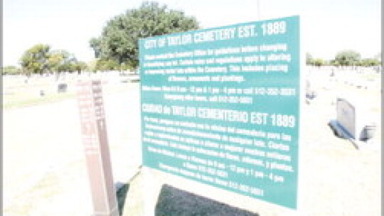 A reminder about rules and regulations near the entrance to the Taylor city cemetery.