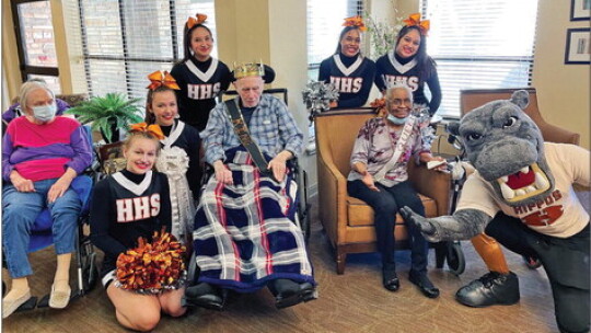 Hutto cheerleaders, along with the Hippo mascot, celebrated homecoming with residents of Falcon Ridge Rehabilitation in Hutto. Photos courtesy of the Hutto ISD Facebook page