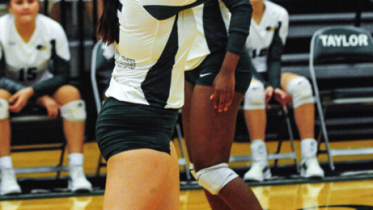 Lady Ducks senior Faith Walker bumps the ball during game against Caldwell Photo by Larry Pelchat