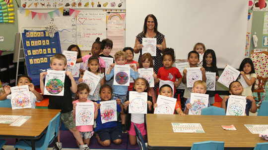 Students in Jennifer Harris’ kindergarten class display their artwork in honor of International Dot Day.