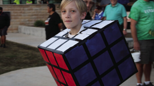 Reed Davis, 11, is a genius with his completed Rubik’s Cube costume at Spooktacular.