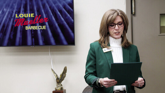 Rachael Westerman, the Chamber’s membership and operations director, makes a presentation Nov. 2 recognizing the Taylor Press.