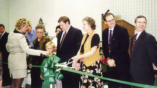 A ribbon cutting ceremony for Pasemann Elementary in the Fall of 1998 with (Center) Taylor ISD communications liaison Tim Crow, the late school counselor Naomi Pasemann, and former Taylor ISD Superintendent Gary Patterson. Courtesy photo Taylor ISD