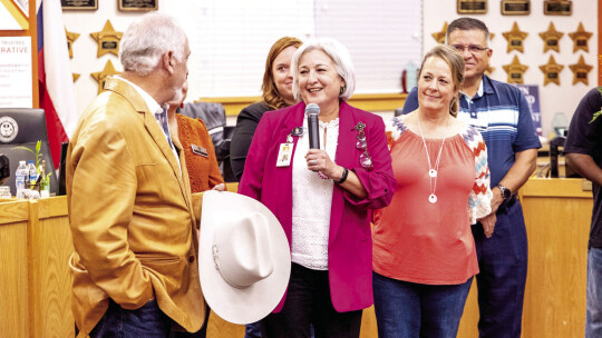 Hutto ISD Superintendent Celina Estrada Thomas thanks the board and staff members for their work and efforts. Photo courtesy of the Hutto ISD Facebook page