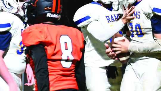 Rams senior Andrew Flores celebrates his touchdown with his teammates. Courtesy photo