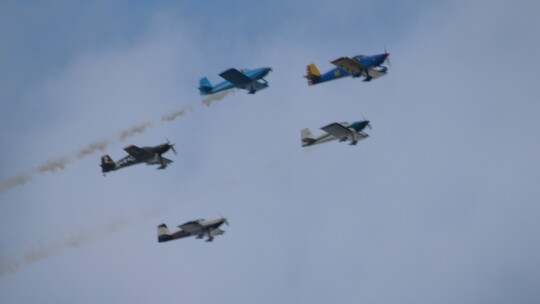 Thursday’s flyover featured 15 aircraft including WWII bombers, fighters and transports plus a historic C-47 Skytrain. Photo by Edie Zuvanich