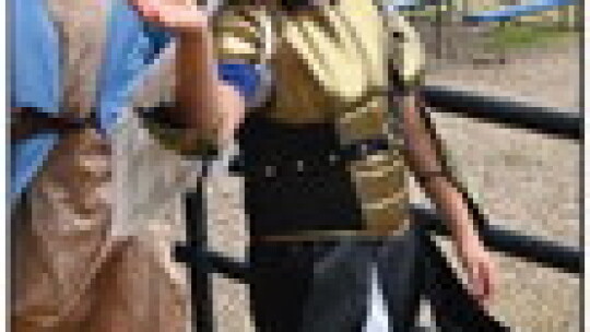 Carter Johnson waves to the camera during the saint parade at St. Mary’s.