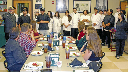 Taylor High School Culinary Arts instructor, Chef Mike Erickson, introduces his student chefs to the Taylor ISD Ambassadors. Photos by Tim Crow