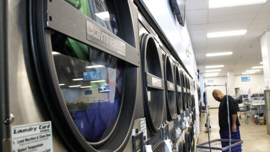 A client waits for his clothes to dry at Skyline Laundry Nov. 28. Photos by Nicole Lessin