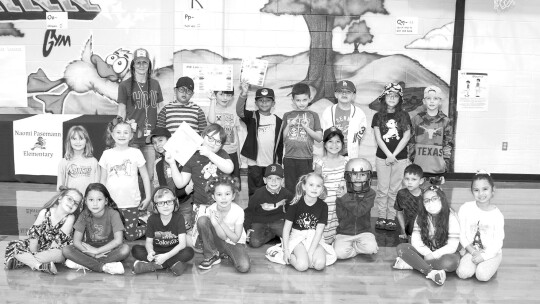 Jennifer Tobler’s second grade class is recognized for having read the most minutes in the school’s recent Read-AThon.